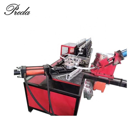 Automatic round flange forming line - Preda Machine